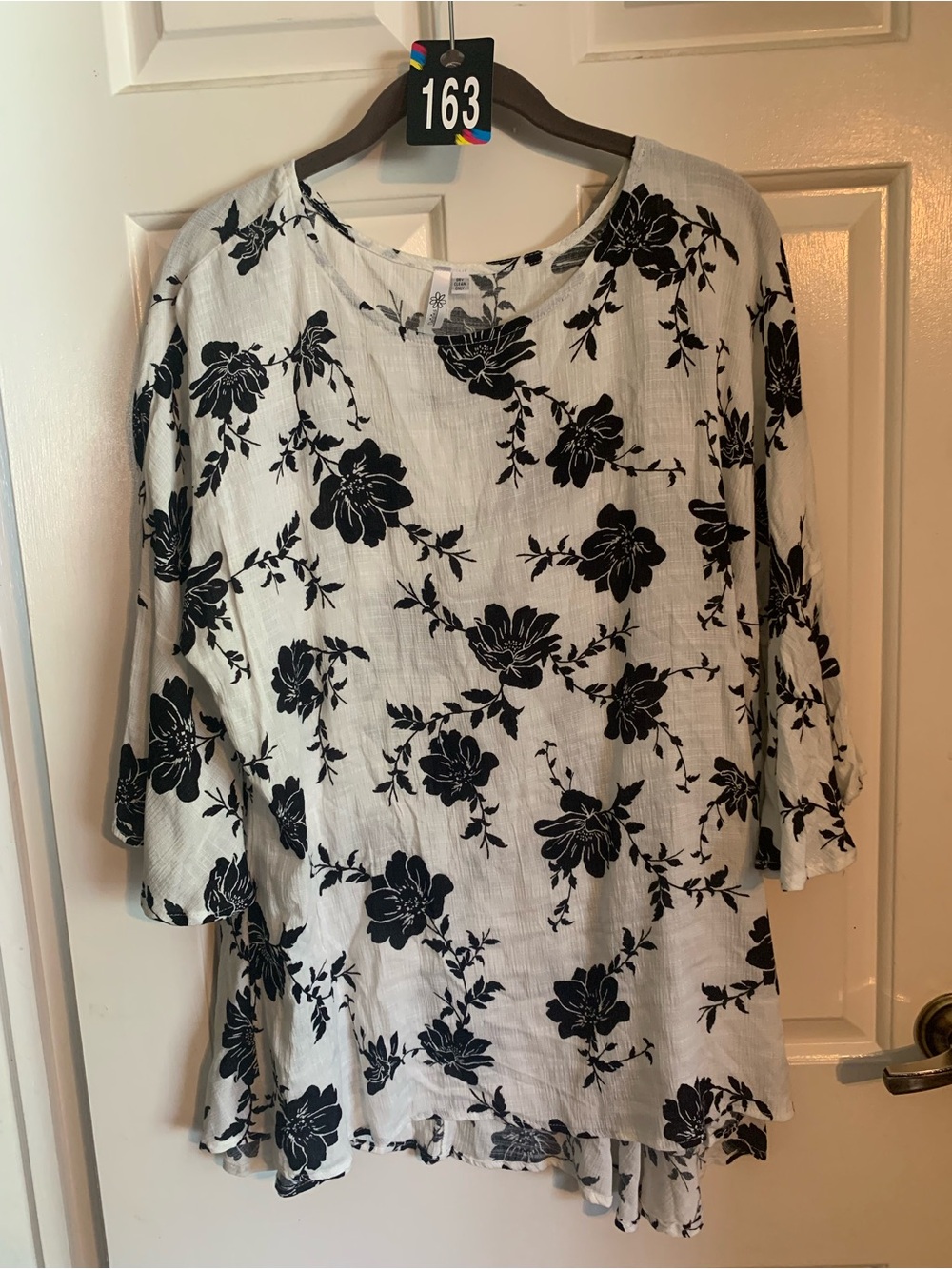 Relaxed White Tunic Top with Black Floral Print